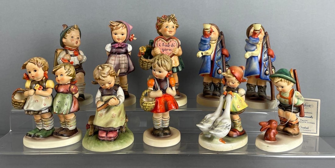 Group of Goebel Hummel Porcelain Children Figurines: Includes special edition no. 1 collectors club measuring 6 inches