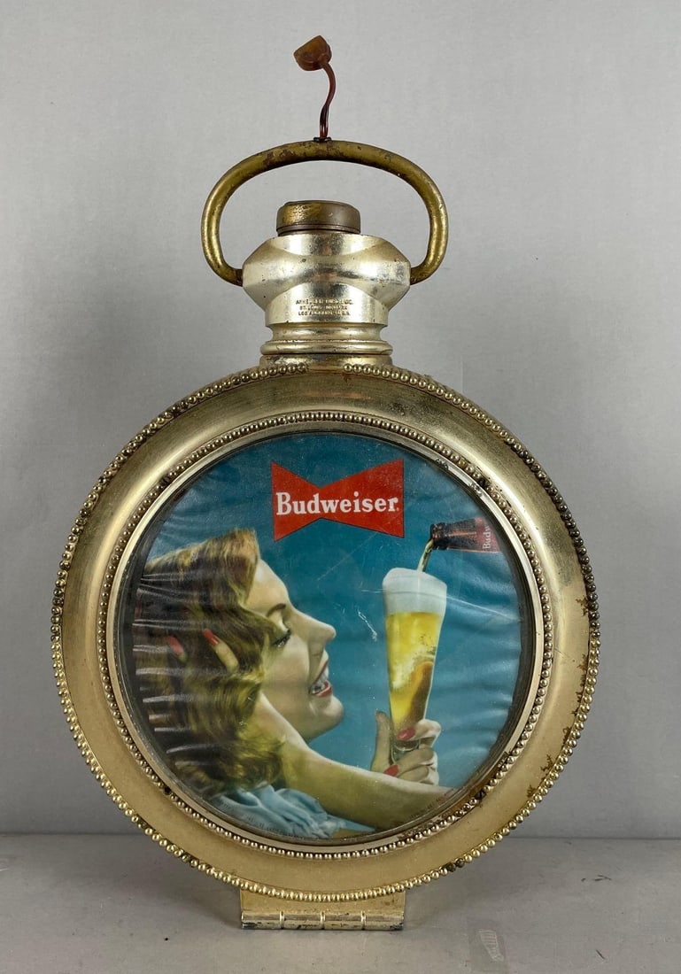 Vintage Budweiser Beer Light-Up Rotating Advertising Clock: Pocket watch, missing cord, measures 18 inches x 12 1/2 inches x 3 3/4 inches