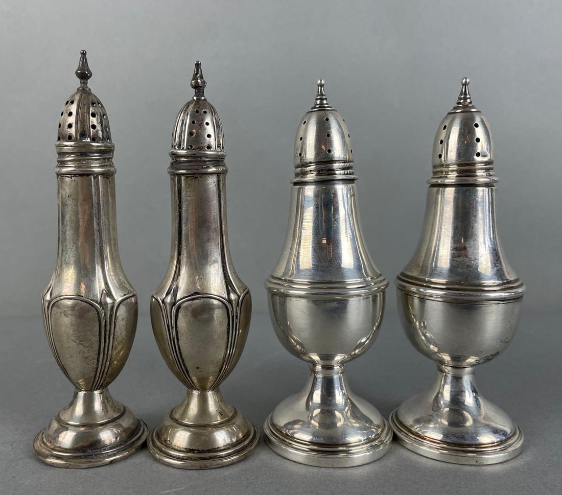 Group of Weighted Sterling Silver Salt and Pepper Shakers: Stamped on bottoms. Largest measures 5 1/4 x 1 1/2 inches