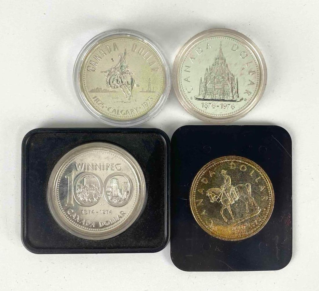 Group of 4 Royal Canadian Mint Commemorative Silver Dollar Proof Coins: Includes Canada Mountie Silver Dollar, Winnipeg 100th Anniversary, Calgary Centennial and more.