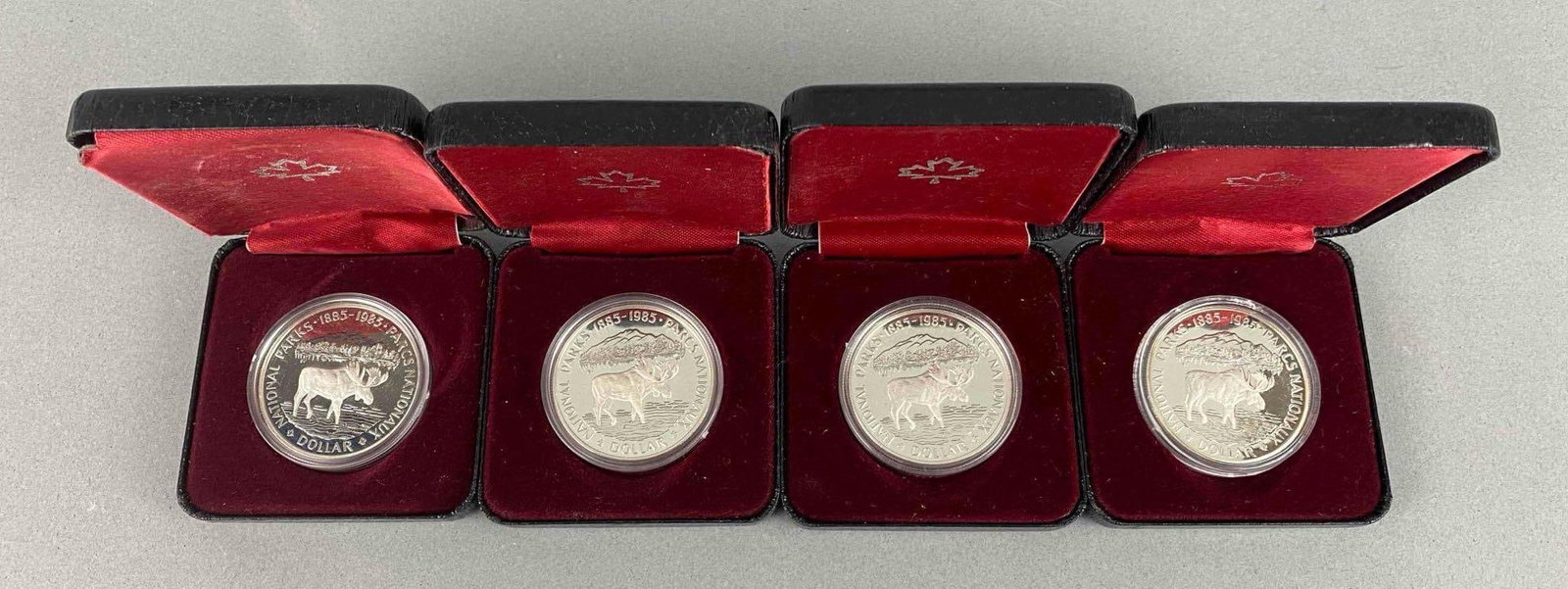 Group of 4 1985 Royal Canadian Mint Silver Dollars Commemorative Coins 100th Anniversary of Canada N: Group of 4 1985 Royal Canadian Mint Commemorative Coins 100th Anniversary of Canada National Parks