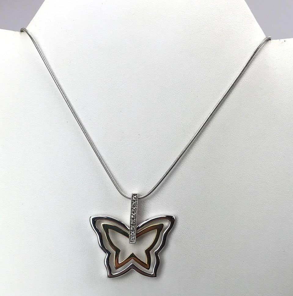 14k Gold and Sterling Diamond Butterfly Pendant Necklace: 20 inches long. 8.9g total weight.