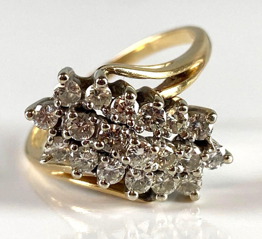 14KP Gold Diamond Ring: Total weight 5.8g, Marked E 100 on inside of band, Size 9 3/4.