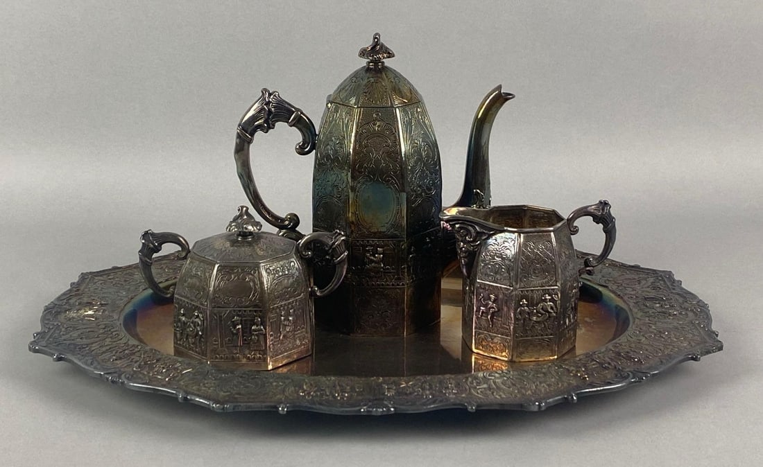 Antique Silver Plate Pictorial Tavern Tea Set with Tray: Includes creamer, sugar and tea pot, features beautiful scrollwork surrounding pictorial tavern scenes throughout all 4 Pieces, all pieces except tray features markings on base, tray measures 11 inche