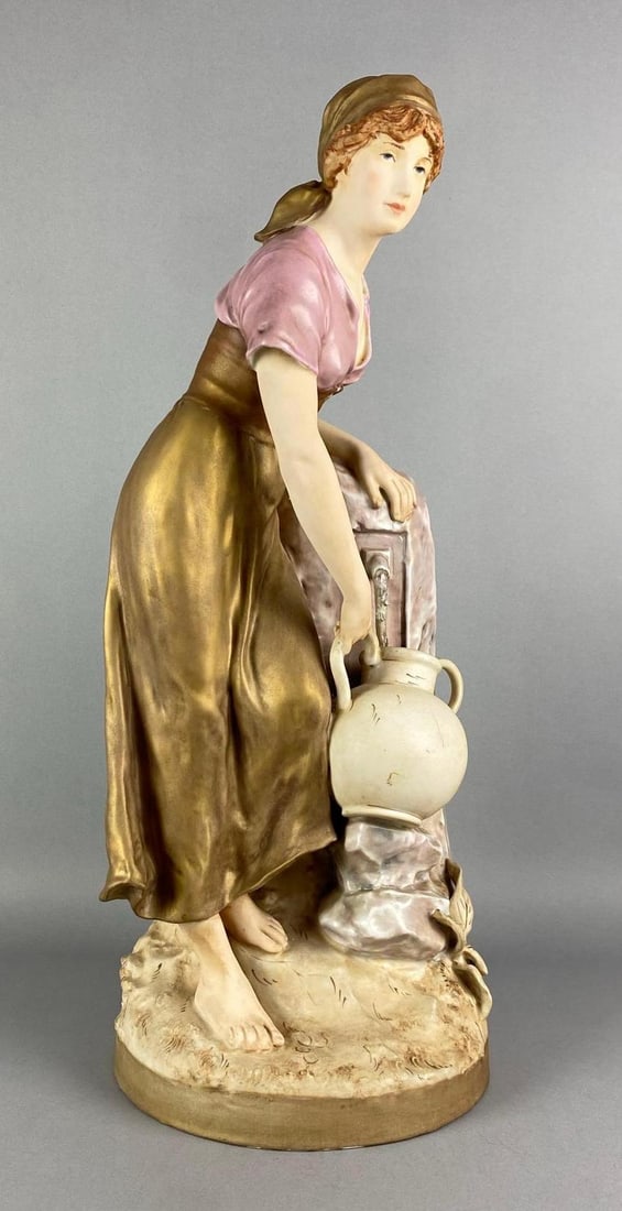 Royal Dux Art Nouveau Young Woman at Water Pump Porcelain Figurine: Reglued Handle on one of the Vases, Marked on inner wall of base, measures 23 1/2 inches H x 9 inches W x 8 inches D
