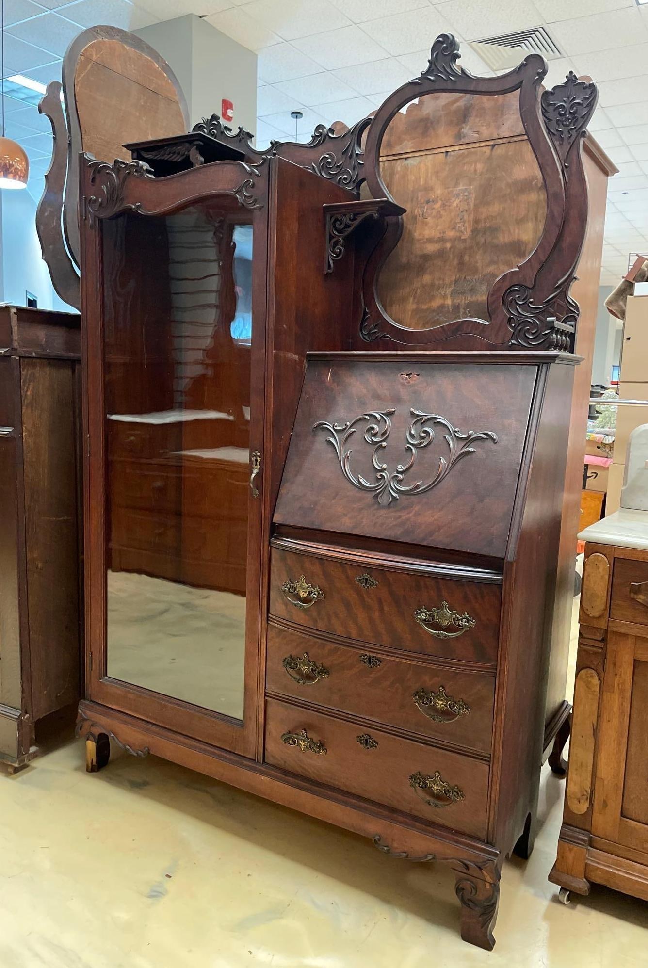 Antique Victorian Walnut Secretary / Bookcase: No in-house shipping available, 3rd party shipper or pickup. Missing mirror, missing keys, includes 4 wood shelves, some broken pieces included, measures 70 1/2 inches x 44 1/2 inches x 15 inches