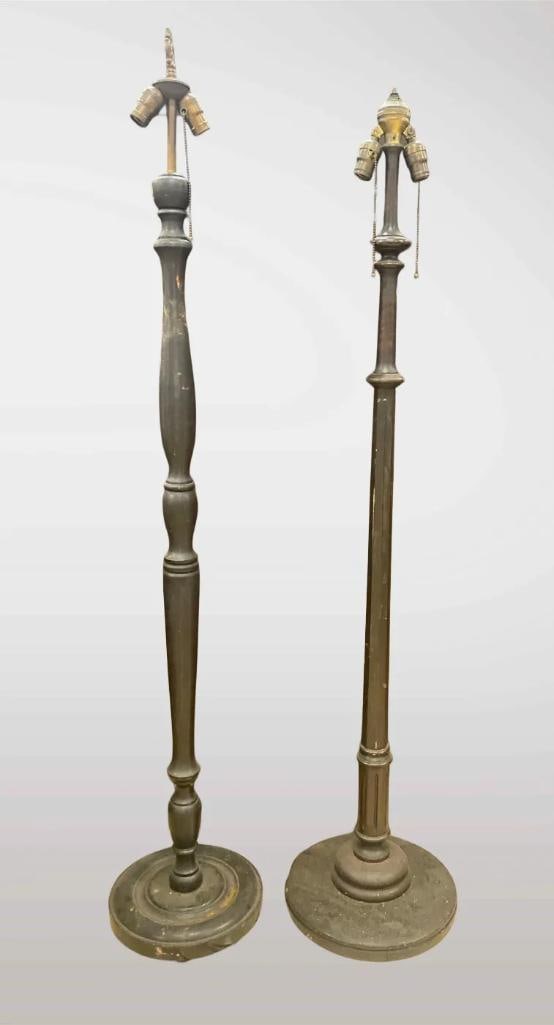 Group of 2 Antique 1930s Turned Wood Floor Lamps: Untested. Measures 60 inches tall. No in house shipping, third party recommended. Will need rewiring due to multiple cracks in original wires