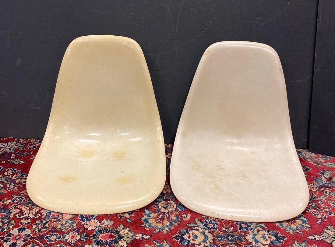 Group of 2 Vintage 1960s Herman Miller Fiberglass Shell Chairs: Missing legs. One shell measures H 17 x W 16 x L 18 inches.