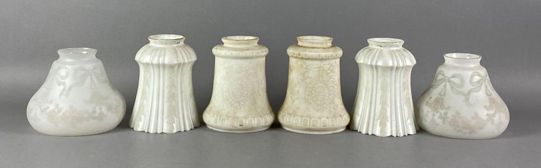 Group of 6 Antique Art Nouveau Satin Etched Glass Lamp Shades: Needs cleaning, largest measures 5 1/2 inches H x 4 inches W with a 2 1/4 inches fitter