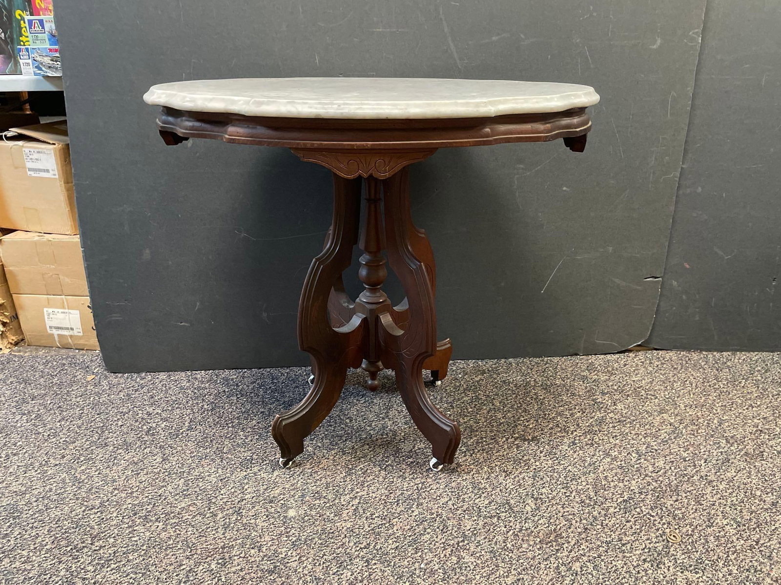 Antique Victorian Walnut Marble Parlor Table: No in-house shipping available, 3rd party shipper or pickup only. Measures 29 inches x 31 1/2 inches x 22 1/2 inches