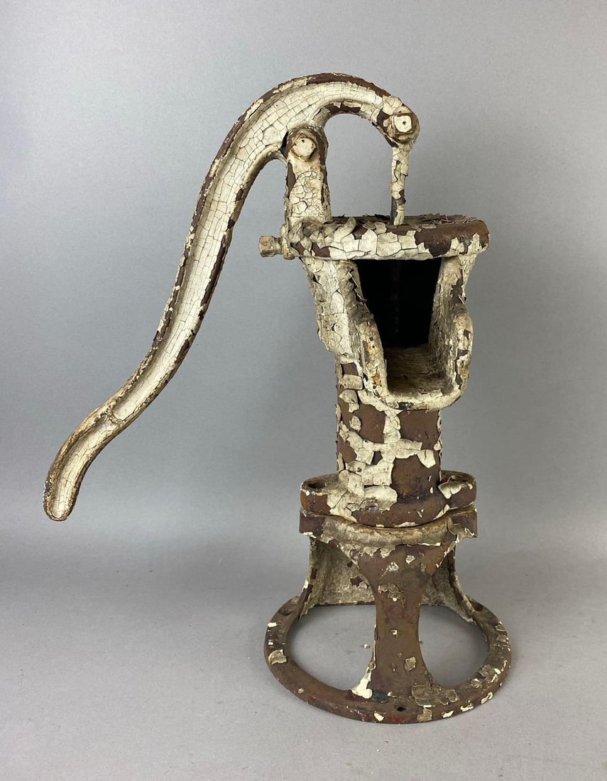 Antique Cast Iron Well Water Hand Pump: Rust and paint flakes throughout. Heavy. Measures 18 inches tall.
