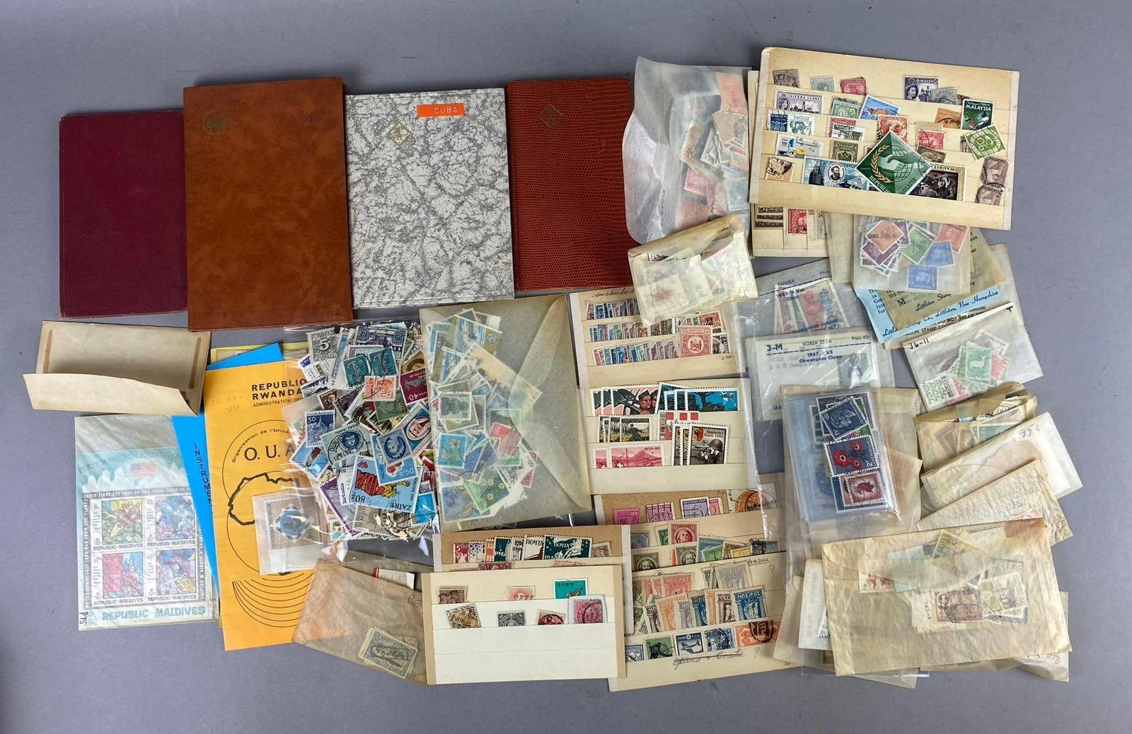 Group of 100+ Vintage Foreign Used Postage Stamps: Includes Russian, German, Polish, and more.