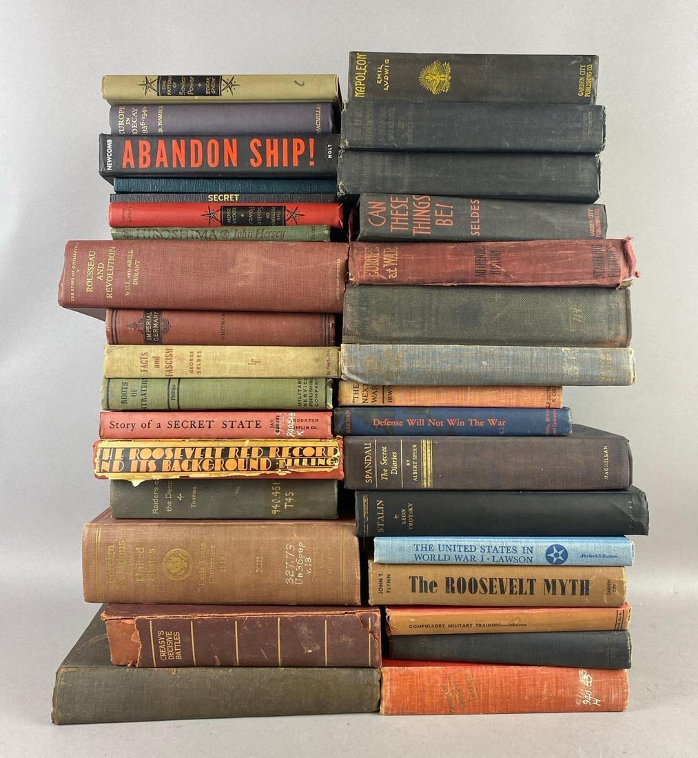 Group of 30+ Antique Military Themed Hardcover Books and More: Includes Stalin, Spandau, and more. Largest measures L 9 x W 8 inches. Rips and tears throughout.