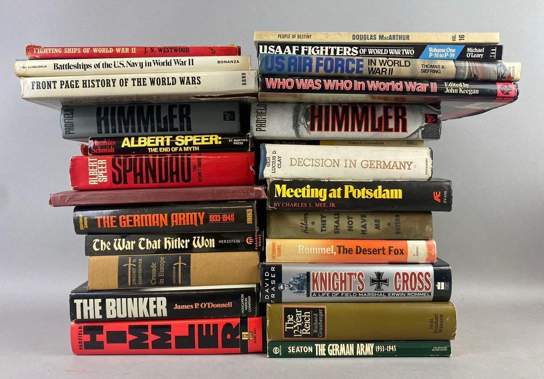 Group of Assorted WW2 German Themed Books and More: Includes Spandau, The Bunker, and more. Rips and tears Throughout. Largest measures L 7 x W 5 inches.
