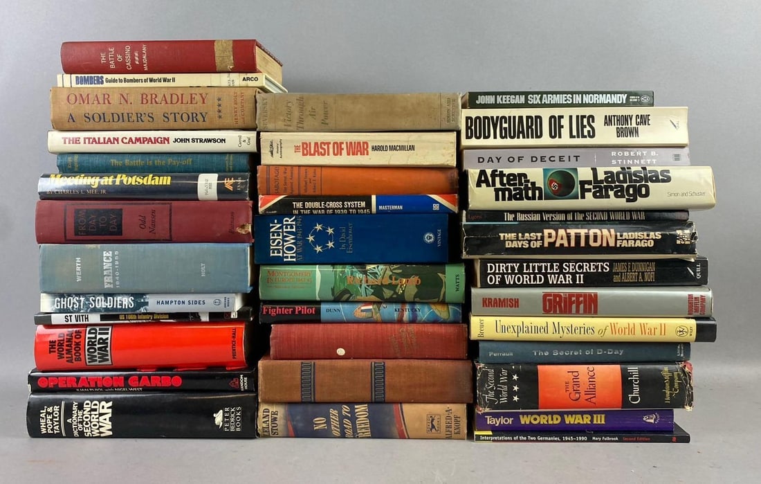 Group of Assorted WW2 German Themed Hardcover Books and More: Includes Ghost Solider, Fighter Pilot, and more. Largest measures L 8 x W 6 inches.