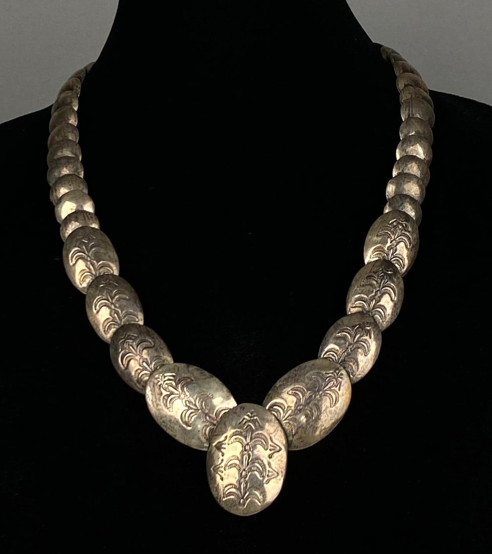 Sterling Silver Disc Necklace: Total weight of 65.6 grams, Measures 23 inches in length