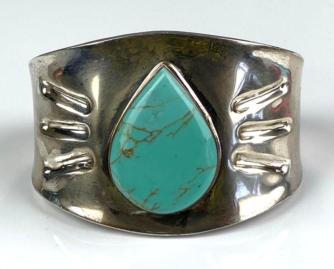 Sterling Silver Teardrop Turquoise Cuff Bracelet: Inner circumference measures 7 inches H x 1 inches W