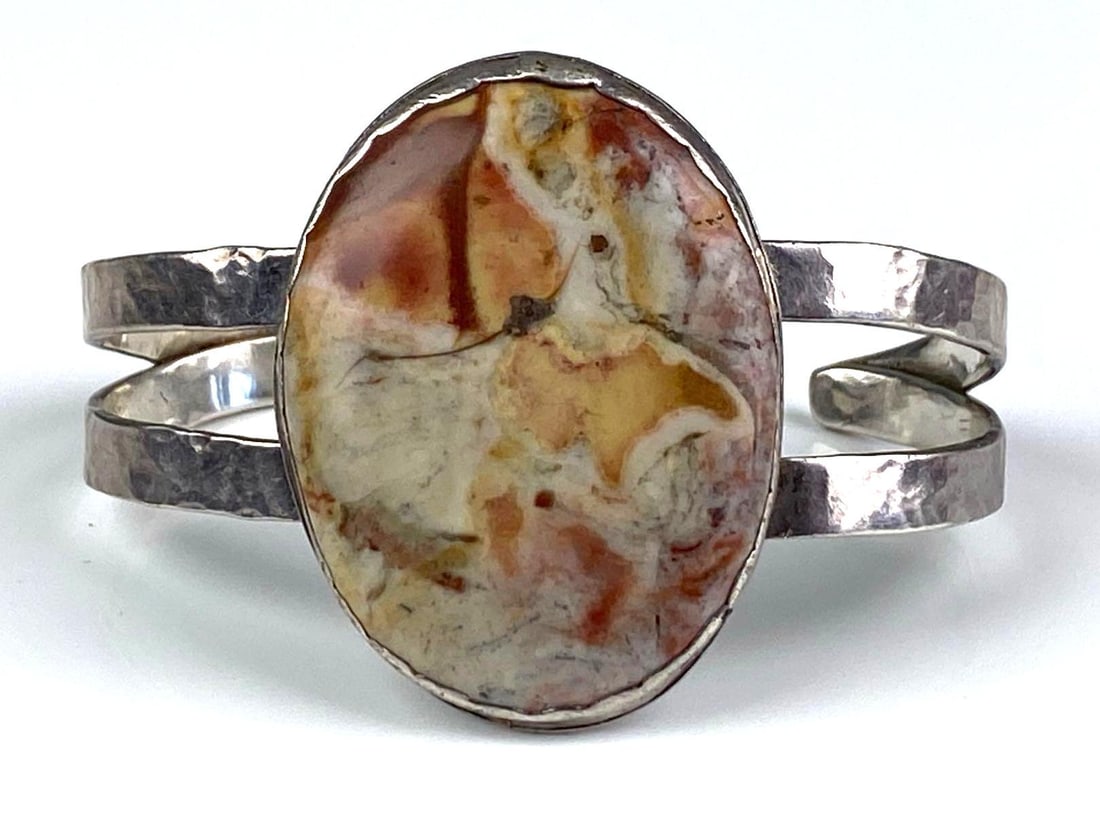 Sterling Silver Cuff Bracelet: Measures 1 1/2 inches H, inner circumference measures 6 inches with a 1 1/2 inches opening