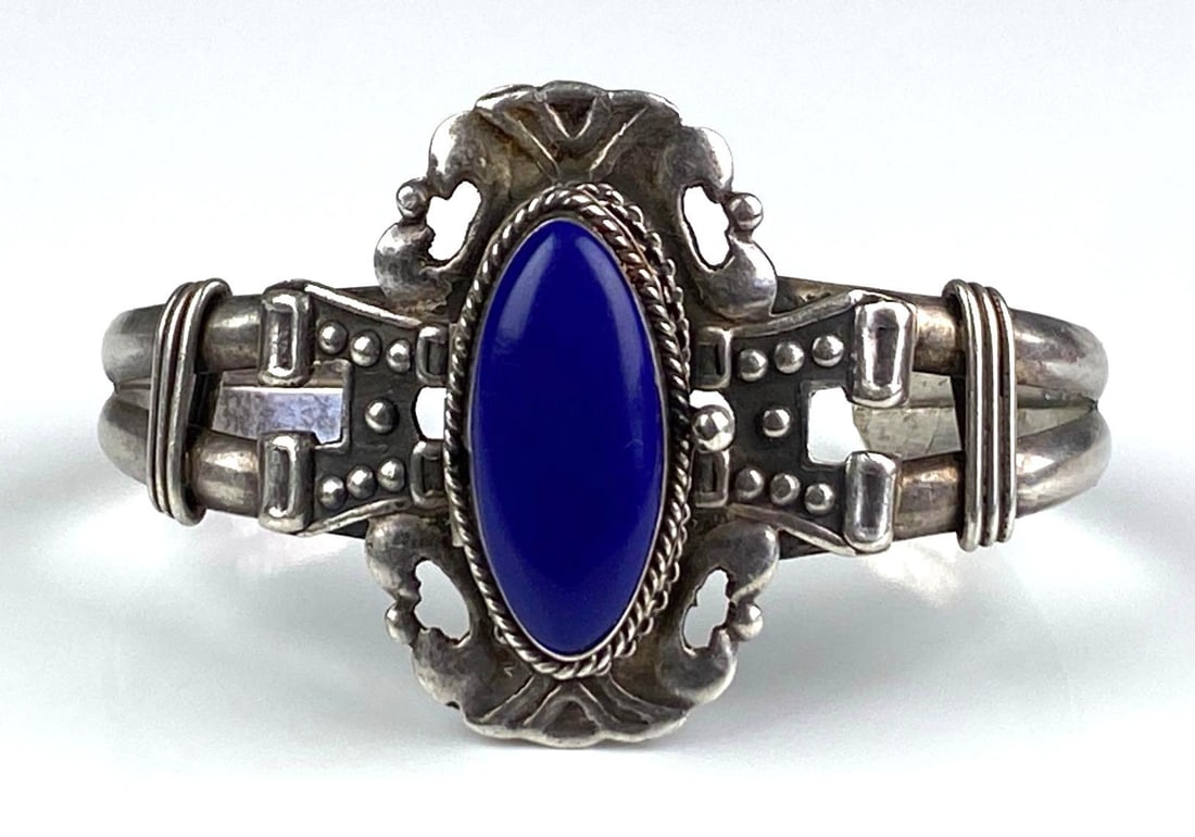 Mexican Sterling Silver Lapis Lazuli Cuff Bracelet: Inner circumference measures 6 1/2 inches with a 1 1/4 inches opening