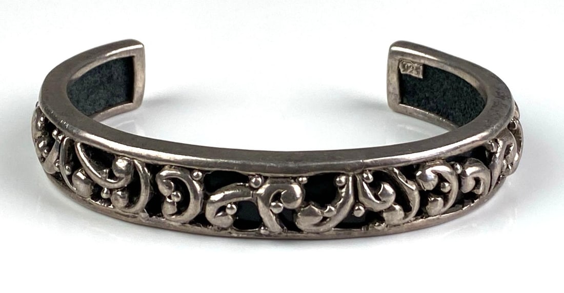Sterling Silver Openwork Filagree Cuff Bracelet: Inner circumference measures 7 1/4 inches with a 1 1/2 inches W