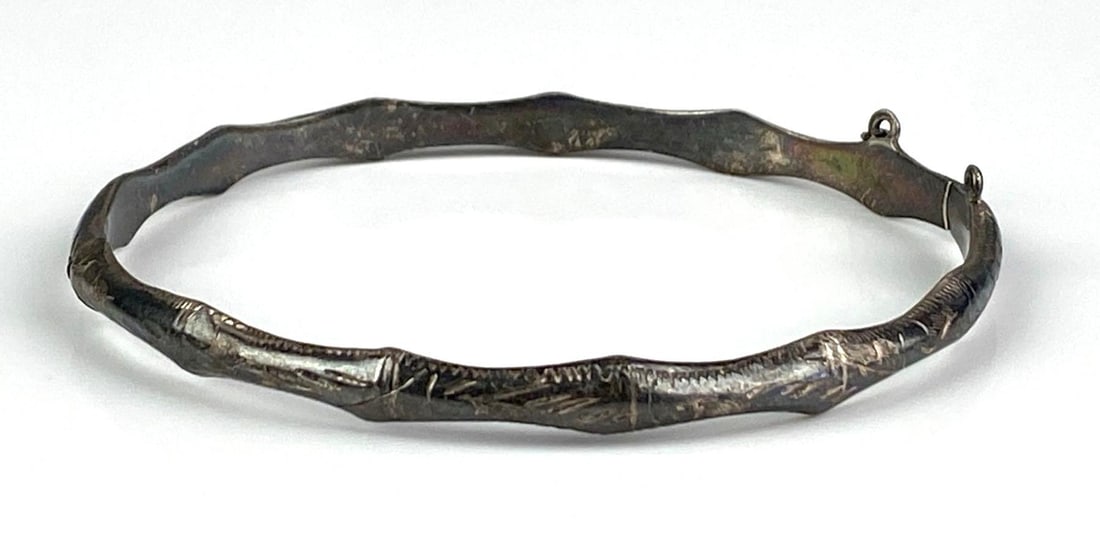 Sterling Silver Bamboo Engraved Hinged Bangle: Features engraved birds in flight, measures 2 1/2 inches W x 2 1/2 inches D