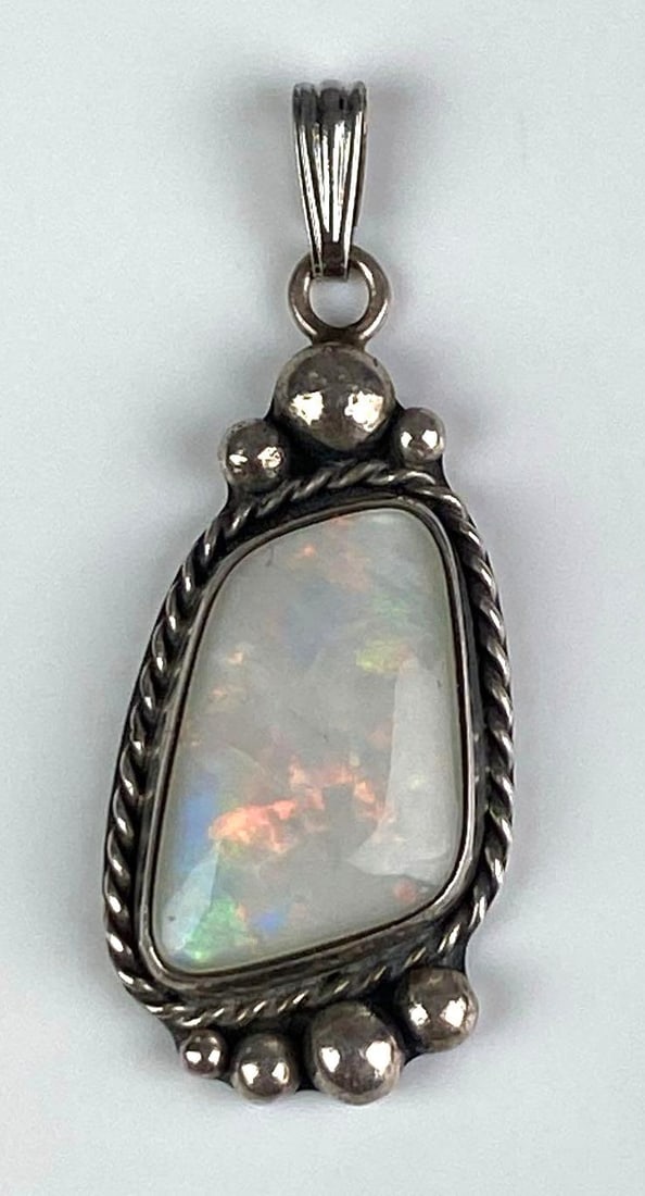 Signed Sterling Silver Fire Opal Pendant: Measures 1 1/2 inches H x 1/2 inches W