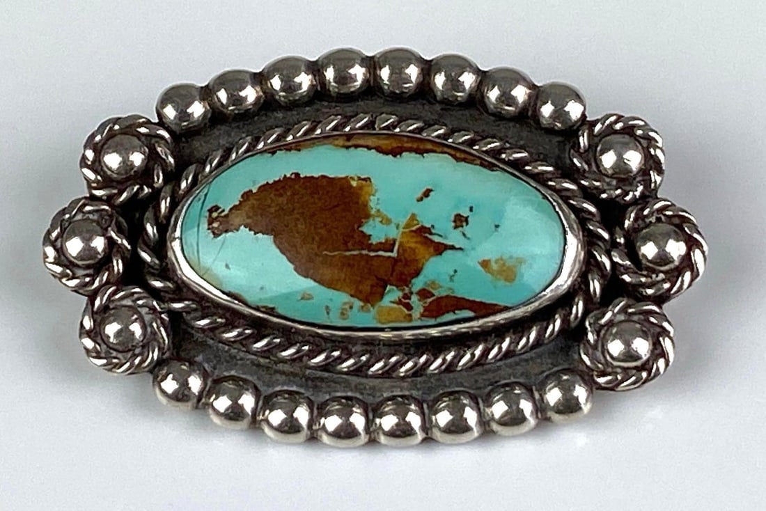 Sterling Silver Native American Turquoise Brooch/Pendant: Measures 1 inches H x 1 3/4 inches W