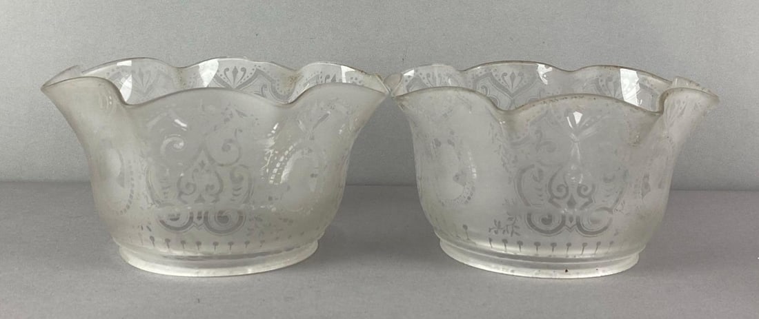 Group of 2 Art Nouveau Style Frosted Etched Glass Lamp Shades: Features ruffled rim and woman silhouette motif, each measures 4 1/4 inches H x 8 inches W with 4 3/4 inches fitters