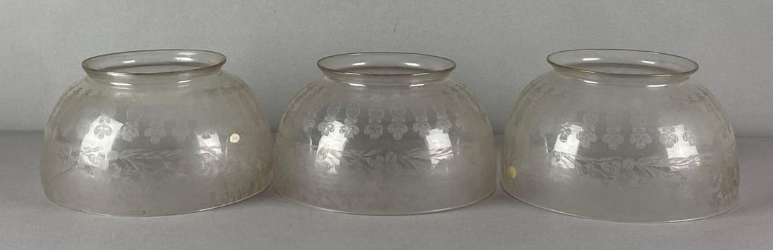 Group of 3 Floral Motif Etched Glass Lamp Shades: Need cleaning, each measures 4 1/2 inches H x 7 1/2 inches W with 5 inches fitters