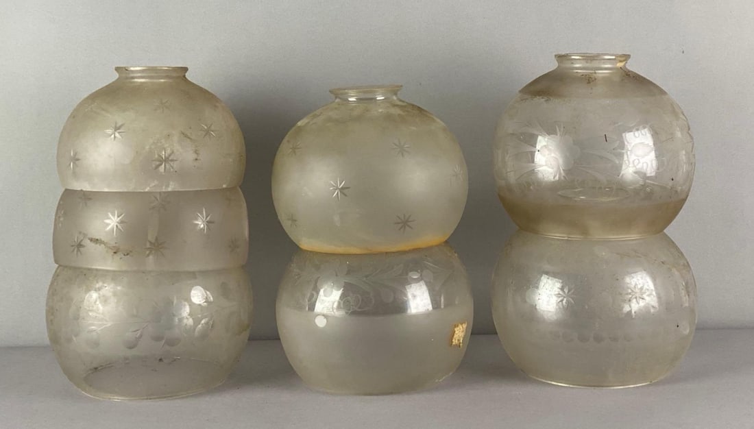 Group of 7 Frosted Etched Glass Lamp Shades: All need cleaning, largest measures 6 1/2 inches H x 6 1/2 inches W with a 2 inches fitter