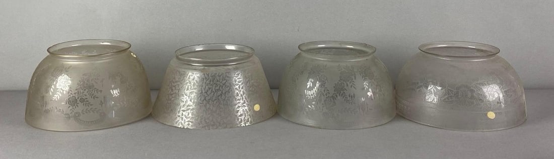 Group of 4 Frosted Floral Etched Glass Lamp Shades: Fleabites and chips on 2 shades, need cleaning, largest measures 4 inches H x 7 inches W with a 5 inches fitter
