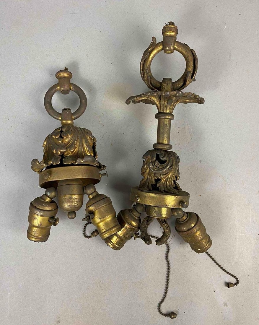 Group of 2 Antique 1930s Art Deco Brass Hanging Light Fixtures: One measure 12 inches in length.
