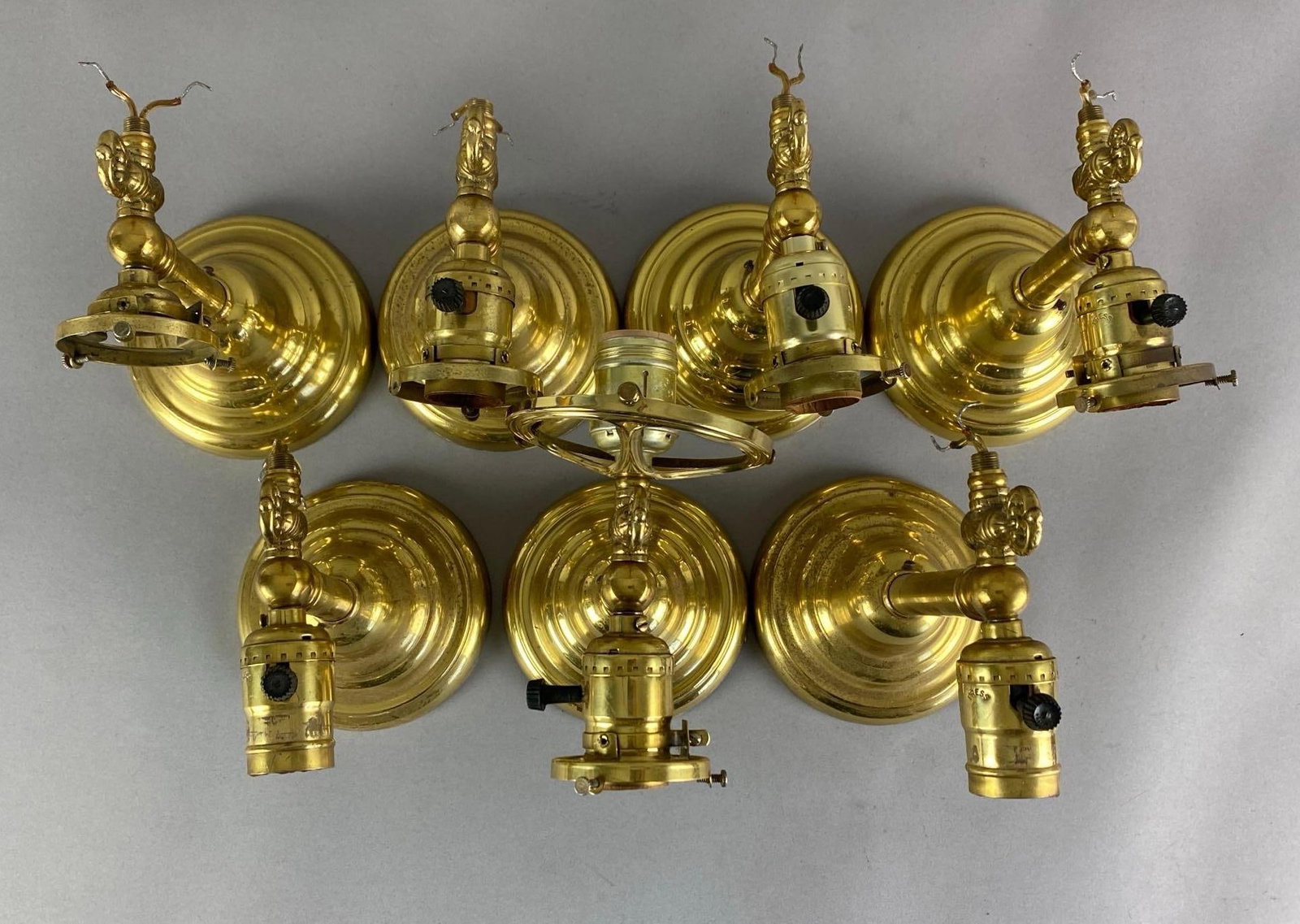 Group of 7 Brass Electric/Gas Wall Sconces: Electrified, largest measures 7 inches H x 5 inches W x 10 inches D