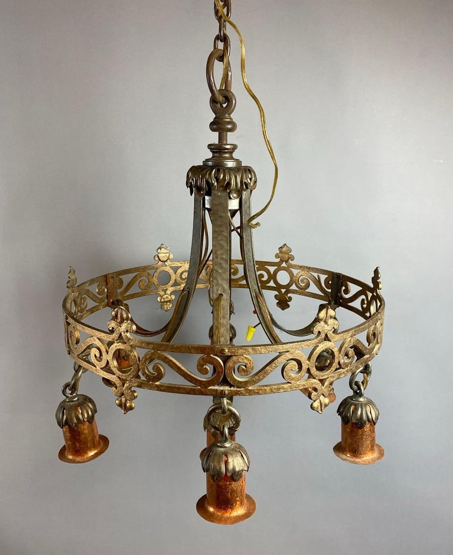 Antique 1930s Spanish Revival Iron and Copper Toned Chandelier: Untested. Will need wiring work. Measures 17 inches in diameter.