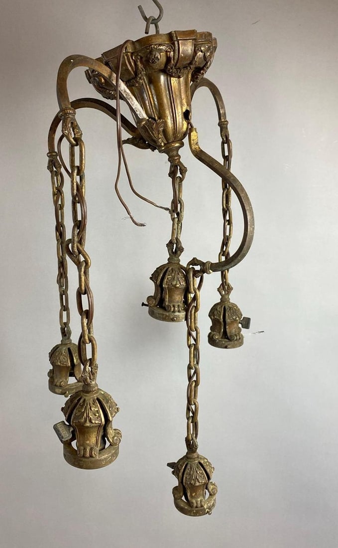 Antique 1920s Spanish Revival Multi-Light Chandelier: Will need wiring. One arm broken off. Measures 20 inches tall.