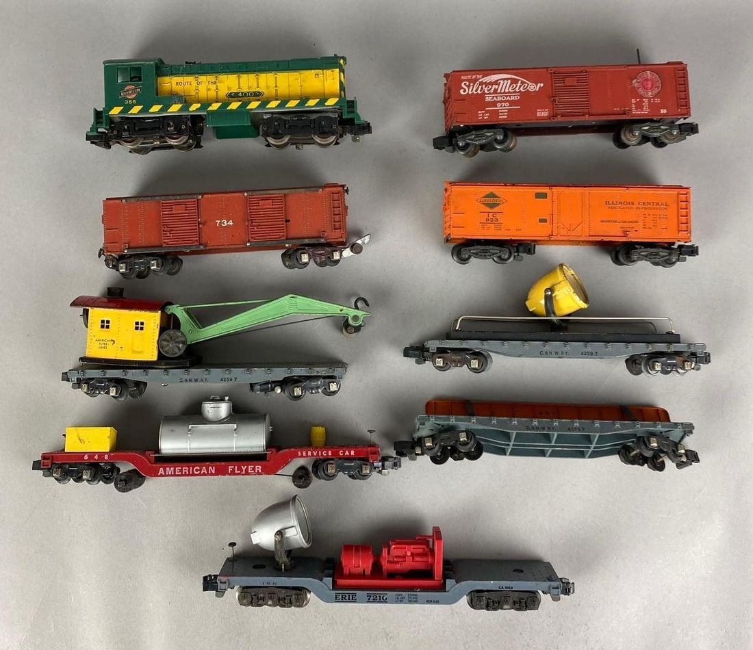Group of American Flyer S Gauge Train Cars and Switcher: Untested, includes northwestern switcher, flat cars, illinois central box car and more, longest measures 12 inches L