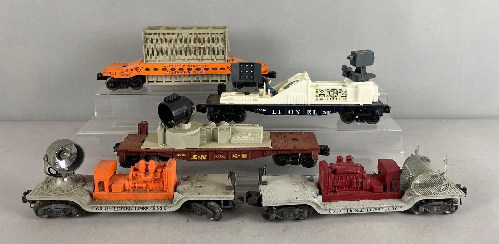 Group of Lionel O Scale Flatcars: Searchlight cars