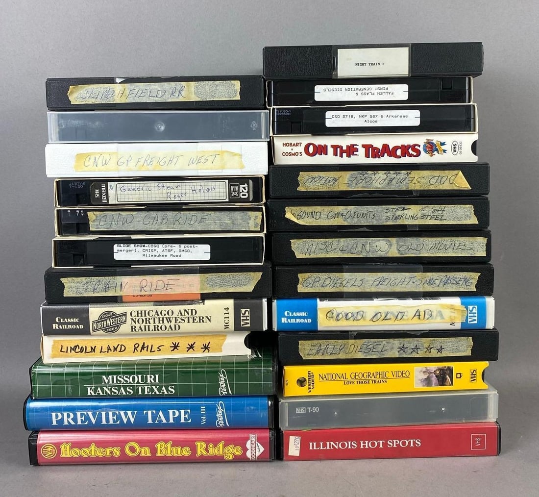 Group of Assorted Vintage Train Themed VHS Tapes: Includes Illinois hotspots, Lincoln Rails, and more. One measures L 8 x W 5 inches.