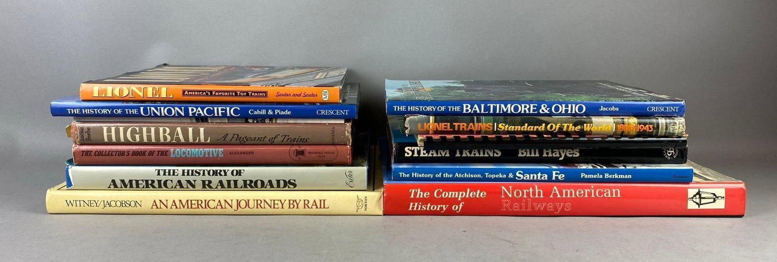 Group of Group of 13 Train Themed Books and More: Rips and tears throughout.largest measures L 11 x W 10 inches.