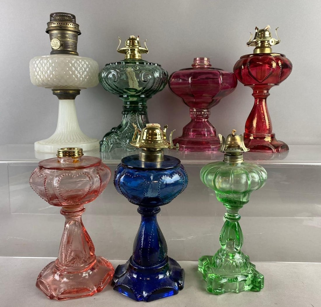 Group of 7 Vintage Beaded Heart Press Glass Hurricane Lamps and More: Blue lamp has cracked base. Largest measures 13 inches tall. Stand not included.