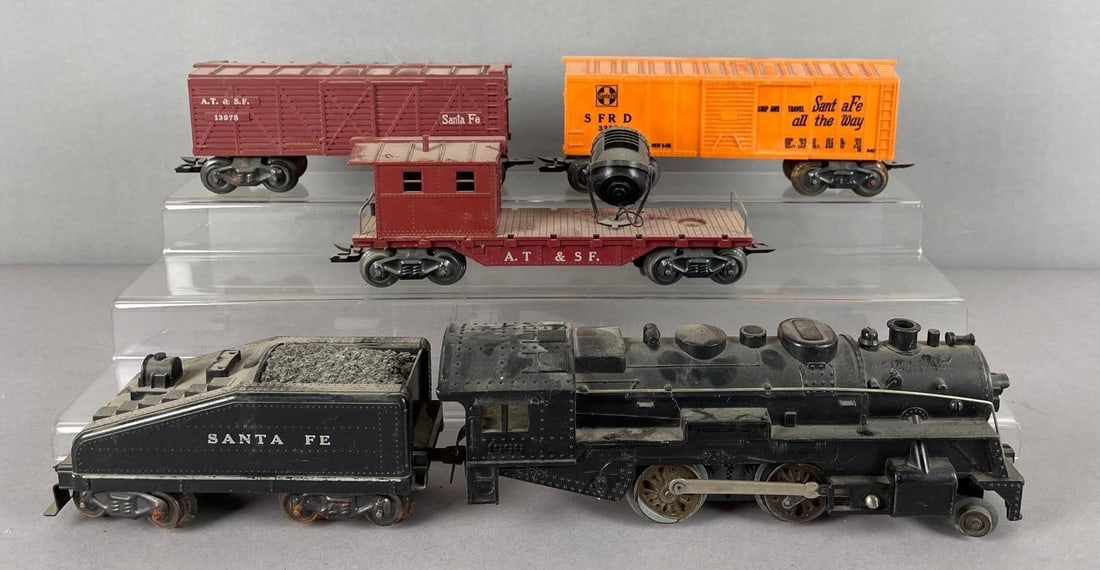 Marx O Scale Steam Locomotive and Freight Train Cars: 1666 missing rear wheels, with tender
