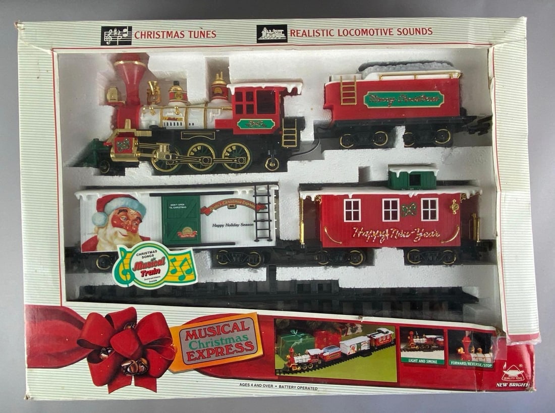1991 G Scale New Bright Musical Christmas Express Train Set: Untested in original box, shelf wear and tears shown on box, box measures 18 1/2 inches H x 25 inches W x 6 1/2 inches D