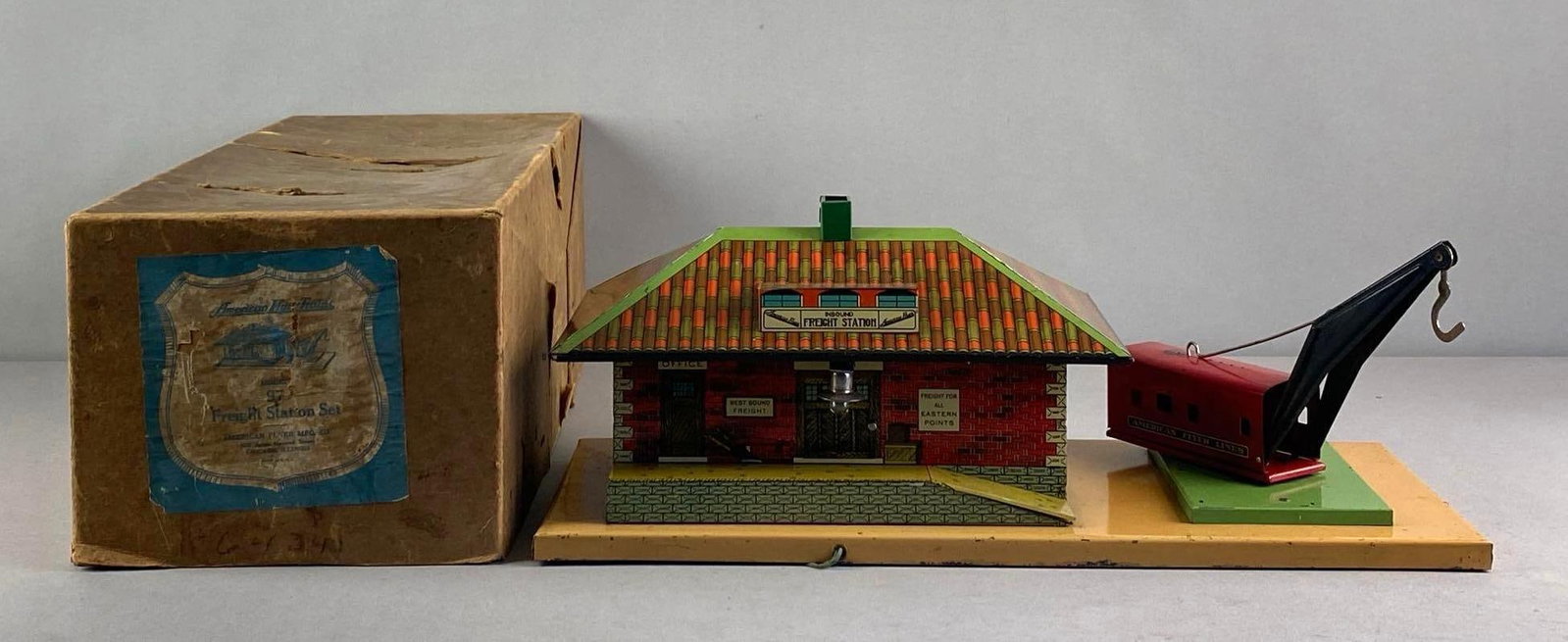 American Flyer Model 97 Tin-Litho Freight Train Station: In original box, measures 7 inches H x 19 inches W x 8 inches D