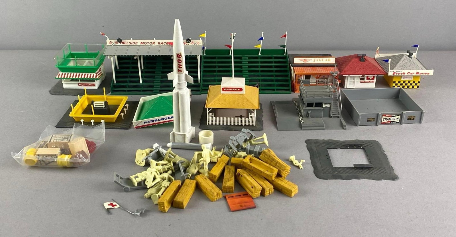 Group of Race Track Miniature Figurines and Buildings (1 of 3)