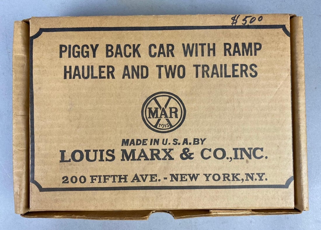 Vintage 1950s Marx Piggy Back Car With Ramp Hauler and Two Trailers: Like new in original packaging. Measure H 3 x W 8 x L 11 inches.