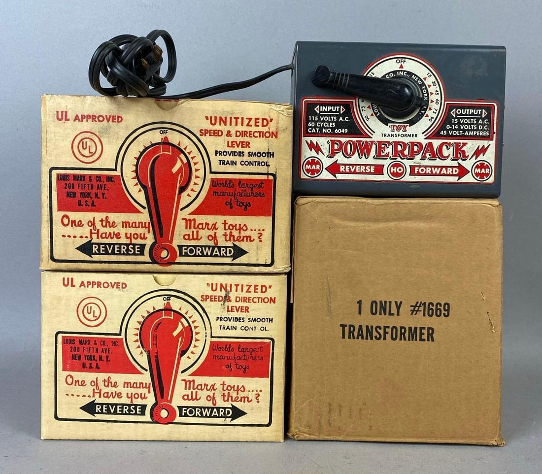 Group of 4 1950s Marx 15 Volts Powerpack Transformers: Like new in original packaging. Untested. Largest measures H 7 x W 3 1/2 x L 6 inches.