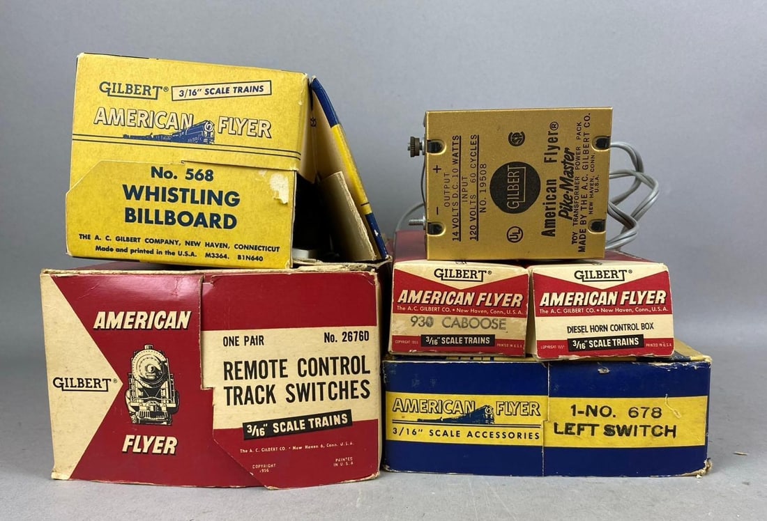 Group of 6 1950s American Flyer S Scale Accessories: Includes Left Switch, Whistle Billboard, and more. Rips and tears throughout. Largest measure 9 inches in length.
