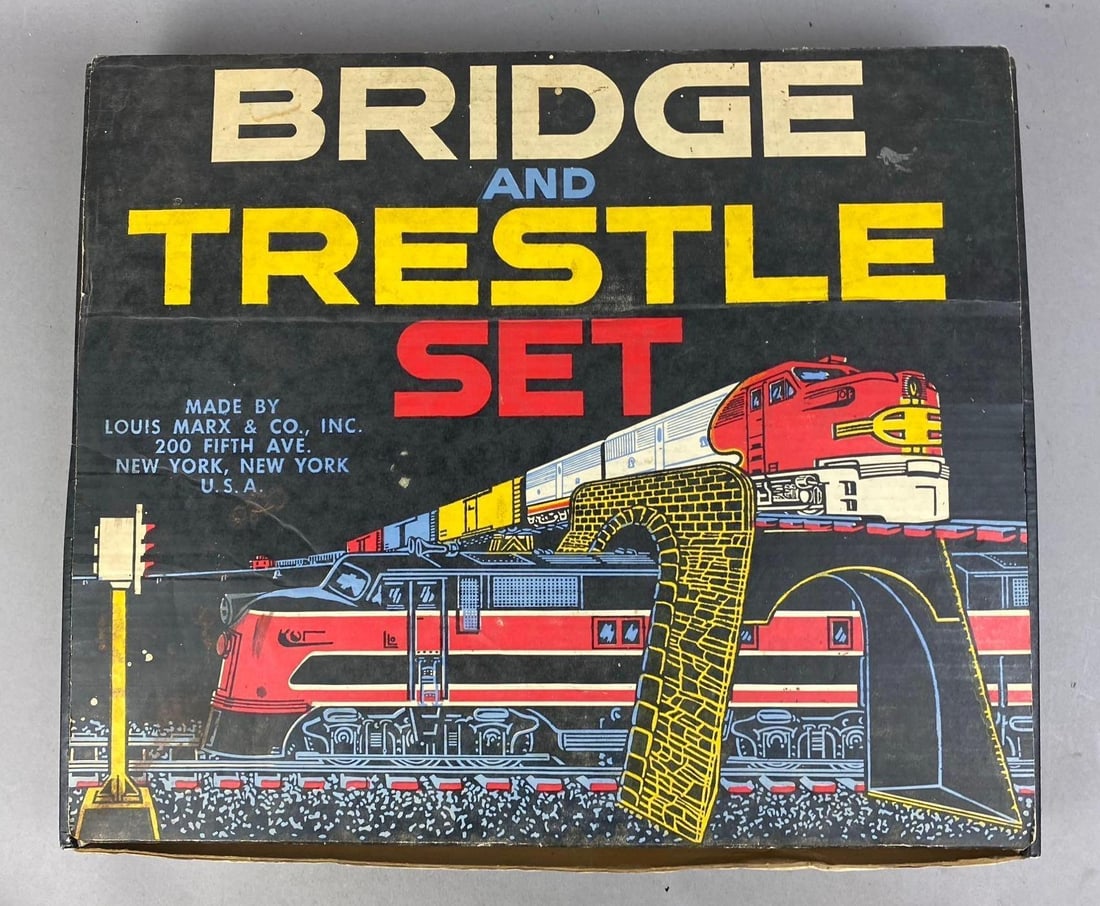 1950s Marx O Gauge Bridge and Trestle Set: Like new in original packaging. Measures H 2 x W 17 x L 20 inches.