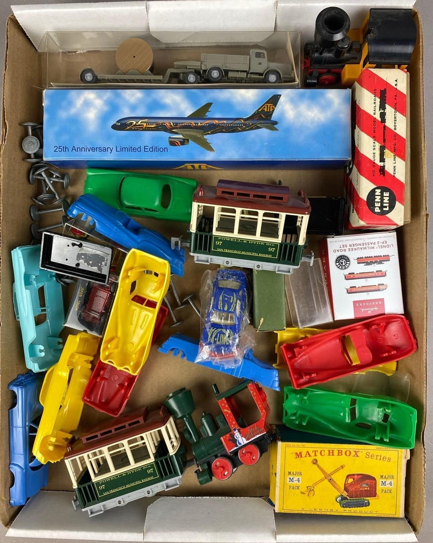 Group of Assorted O Gauge Model Cars and More: Includes matchbox, Trains, and more. Largest measures 5 inches in length.