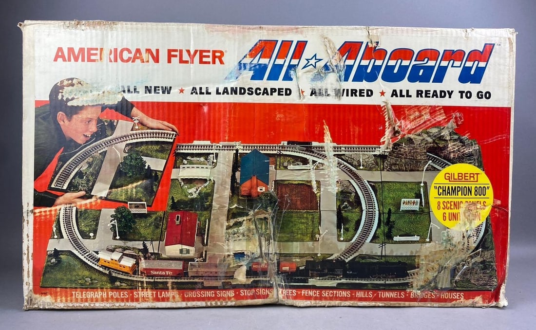 Vintage 1965 American Flyer Gilbert Champion 800 All Aboard S Scale Train Set: Packaging has rips and tears throughout. Packaging measures H 16 x W 10 x L 26 inches.